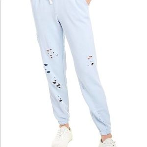 KatieJ NYC super trendy distressed sweatpants.